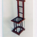 PADUK AND GLASS CHAIR