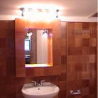 Squared bathroom, cherry wood medicine cabinet